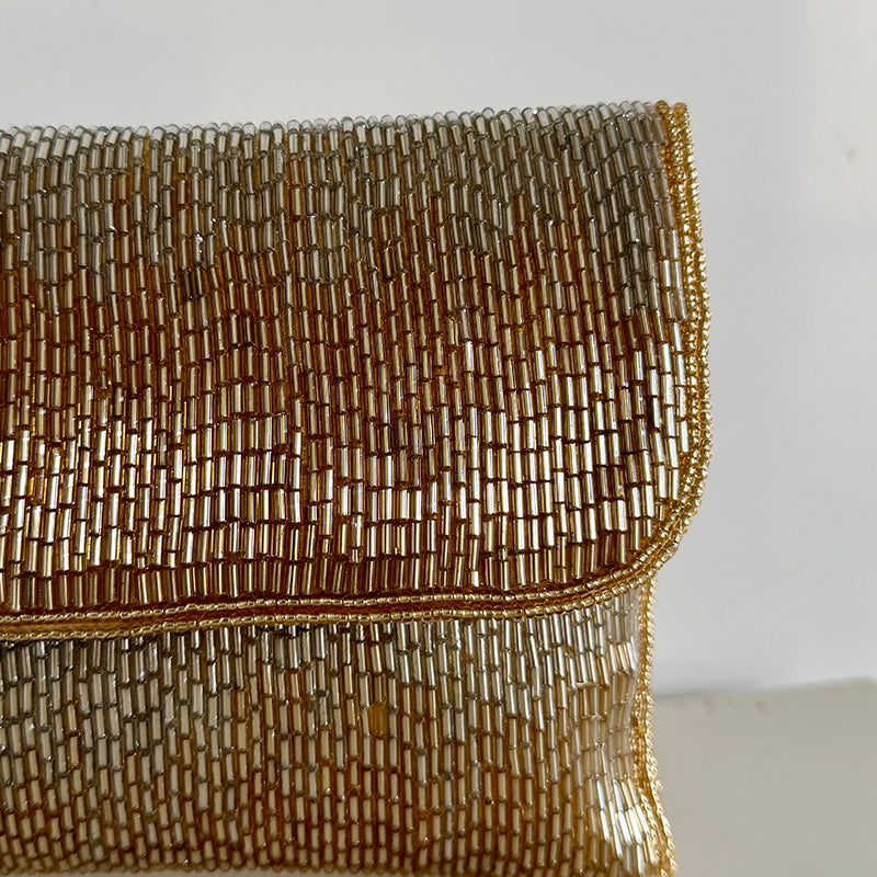 Tube Texture Clutch Shimmery Gold